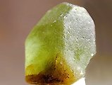 A photo of the mineral olivine